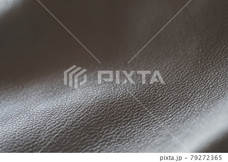 Closeup full grain gray brown leather background Closeup full grain gray brown leather background 79272365