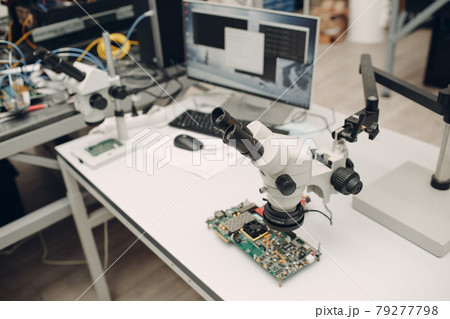 Microscope in Scientific research tech Laboratory on table Microscope in Scientific research tech Laboratory on table 79277798