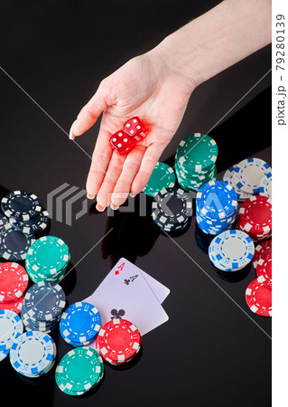 Casino chips, playing cards and dices on dark reflective background 79280139