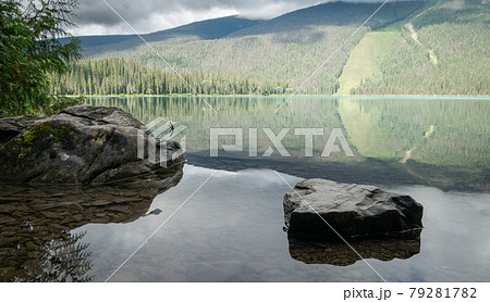 Reflection on pristine alpine lake shot at Emerald Lake, Yoho National Park, British Columbia, Canada 79281782