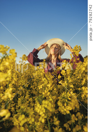 woman in a blooming field woman in a blooming field 79282742