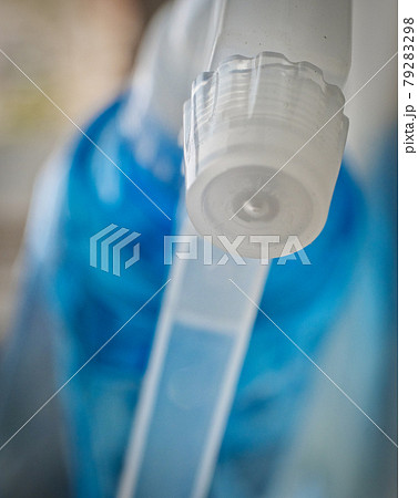 Sprayer head macro. Head of sprayer of blue color 79283298