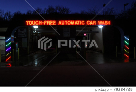 Neon Touch Free Automatic Car Wash Sign during Evening Neon Touch Free Automatic Car Wash Sign during Evening 79284739