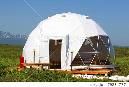 white geodome tent. Cozy glamping, holiday, vacation lifestyle concept. 79284777