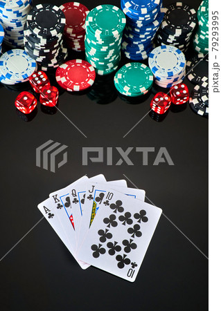 Casino chips, playing cards and dices on dark reflective background 79293995