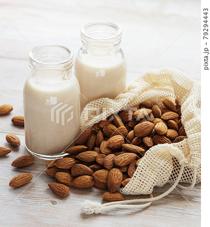 Almond milk and almonds Almond milk and almonds 79294443