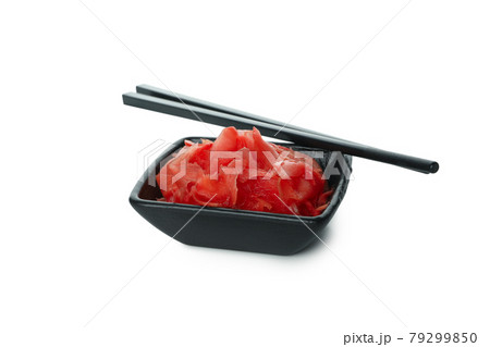 Bowl with pickled ginger isolated on white background Bowl with pickled ginger isolated on white background 79299850