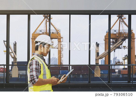 Port and container transportation and dock worker. Port and container transportation and dock worker. 79306510