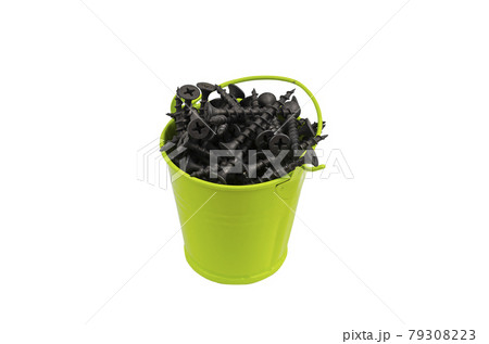 A full bucket of black screws on a white background. A full bucket of black screws on a white background. 79308223