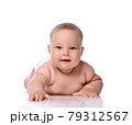 Infant child baby girl kid in diaper lying happy 79312567