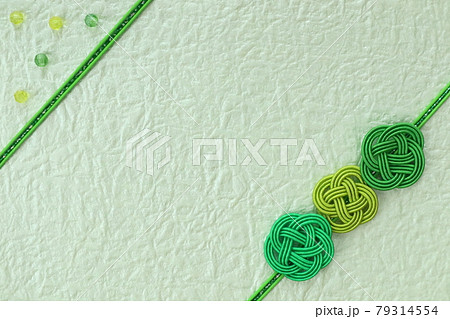 水引飾りの和風背景　背景うすい緑 79314554
