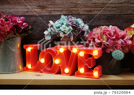 Pink Love LED Decorative on wooden background Pink Love LED Decorative on wooden background 79320064