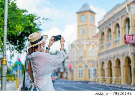 Travelers on street Phuket old town with Building Sino Portuguese architecture at Phuket Old Town area Phuket, Thailand. Travel concept 79320148