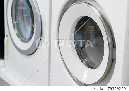 Close up of new dryer machine in household appliances store Close up of new dryer machine in household appliances store 79329260