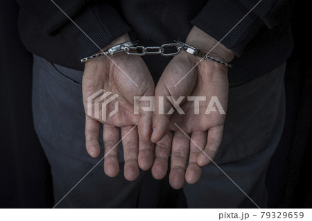 criminal and handcuffs 79329659