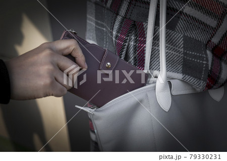 pick pocket wallet from bag pick pocket wallet from bag 79330231