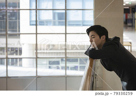 young Asian handsome employee man sighing, work stress 79330259