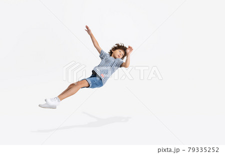 Portrait of Caucasian preschool boy isolated over white studio background. Copyspace. Childhood, education, emotions concept 79335252