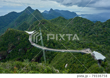 Popular tourist attraction. Bridge over the abyss on one pillar Popular tourist attraction. Bridge over the abyss on one pillar 79336758