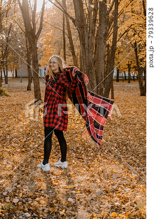 Get Ready for Fall. Prepare yourself for the Fall autumn season. No stress, reduce fall depression, positive emotions. Happy young woman enjoying life in autumn park. 79339628