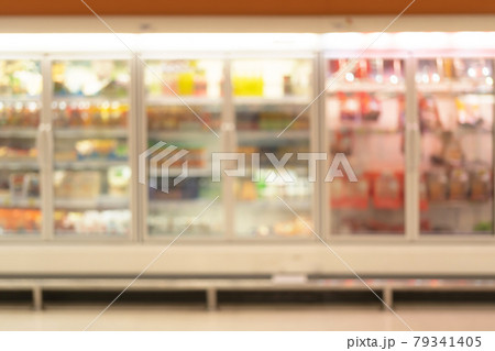 Bokeh blurry background of aisle of label products on shelves at supermarket or grocery store. Food shopping. Lifestyle. Abstract Bokeh blurry background of aisle of label products on shelves at supermarket or grocery store. Food shopping. Lifestyle. Abstract 79341405
