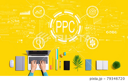 PPC - Pay per click concept with person using a laptop PPC - Pay per click concept with person using a laptop 79346720