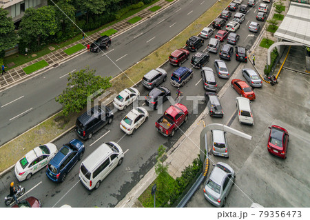 Traffic on highway in Bonifacio Global City, Taguig, Metro Manila 79356473