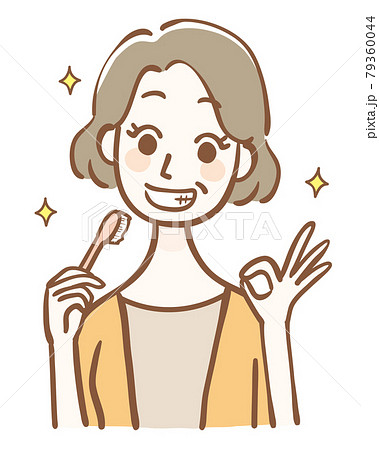 歯ブラシを持ってOKサインをする中年女性 79360044