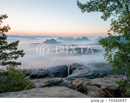 Beautiful morning view Saxony Switzerland. Sandstone peaks and hills Beautiful morning view Saxony Switzerland. Sandstone peaks and hills 79360697