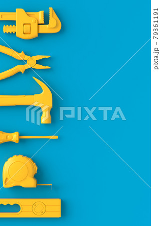 Top view of monochrome construction tools for repair on blue and yellow Top view of monochrome construction tools for repair on blue and yellow 79361191