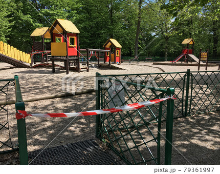 Closed kids  playground  in the park during 2020 quarantine from the Covid-19 Coronavirus. 79361997