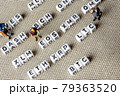 set of popular crypto coins forming rows made of white cubes with black capital letters and miniature businessmen figurines having a team meeting 79363520