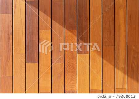 Wood paneling background texture. Ipe Teak Tropical Wood on Building facade Wood paneling background texture. Ipe Teak Tropical Wood on Building facade 79368012