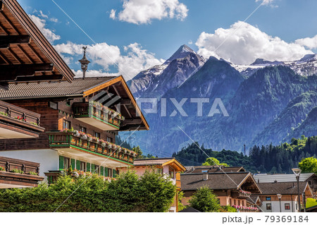 Kaprun village with typical pension against Kitzsteinhorn glacier in Salcburg region, Austrian Alps Kaprun village with typical pension against Kitzsteinhorn glacier in Salcburg region, Austrian Alps 79369184