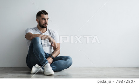 Lonely handsome man sad, stressed in self-isolation, suffering agoraphobia, depression Lonely handsome man sad, stressed in self-isolation, suffering agoraphobia, depression 79372807