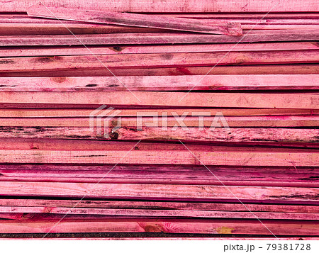 painted pink red colored wooden plank texture as a backdrop painted pink red colored wooden plank texture as a backdrop 79381728