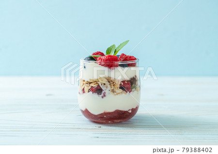 homemade raspberry and blueberry with yogurt and granola homemade raspberry and blueberry with yogurt and granola 79388402