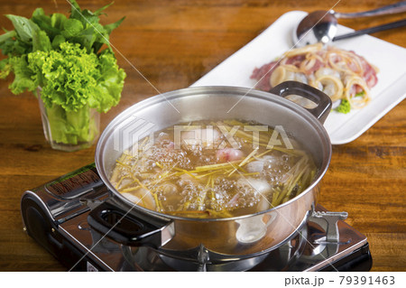 Vietnamese Traditional Food: hotpot with seafood and vegetable with special soup so called "Lau Mam" Vietnamese Traditional Food: hotpot with seafood and vegetable with special soup so called "Lau Mam" 79391463
