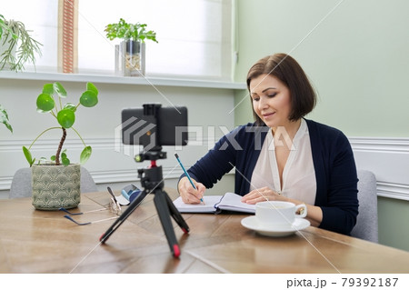 Mature woman psychologist, professional counselor giving video consultation 79392187