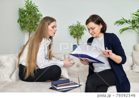 Meeting of young woman patient with psychologist Meeting of young woman patient with psychologist 79392546