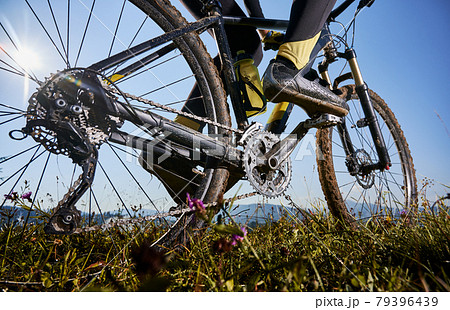 Young man riding a mountain bike downhill style 79396439