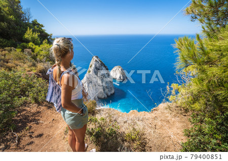 Woman enjoy Mizithres cliff rock in Zakynthos Ionian island, Greece 79400851