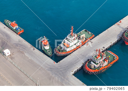 Tugs and Pilot boats are moored in Jeddah port, Saudi Arabia 79402065