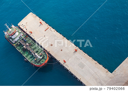 Tanker ship with green deck is moored in Jedda port 79402066