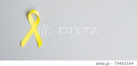 Childhood Cancer, Sarcoma, bone, bladder and Suicide prevention Awareness month, Gold Yellow Ribbon for supporting people living and illness. children Healthcare and World cancer day concept 79403164