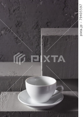 Empty cup of coffee on concrete grey abstract background texture. Coffee as break concept 79405597