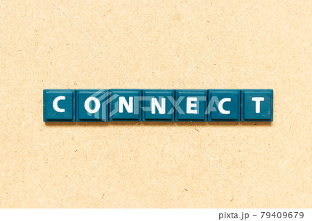 Tile alphabet letter in word connect on wood background 79409679