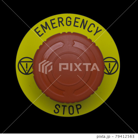 Red emergency button on black panel 79412563