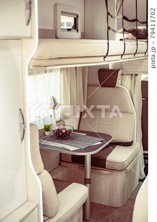 Trailer or car house on wheels in an mobile home. Interior inside table, armchairs 79413702