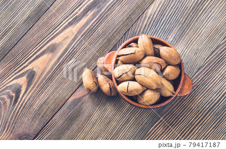 Bowl of pecans 79417187